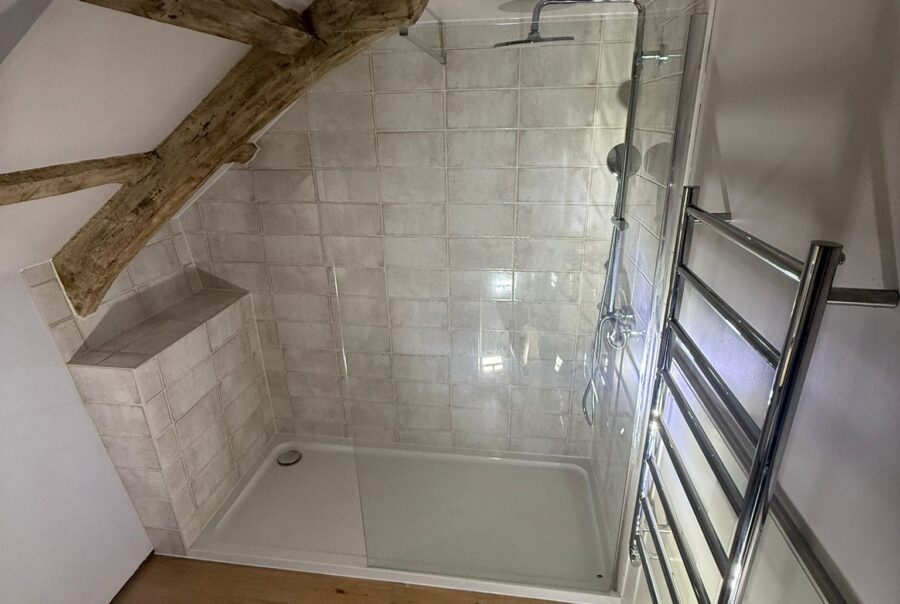 shower room tiling sloped roof
